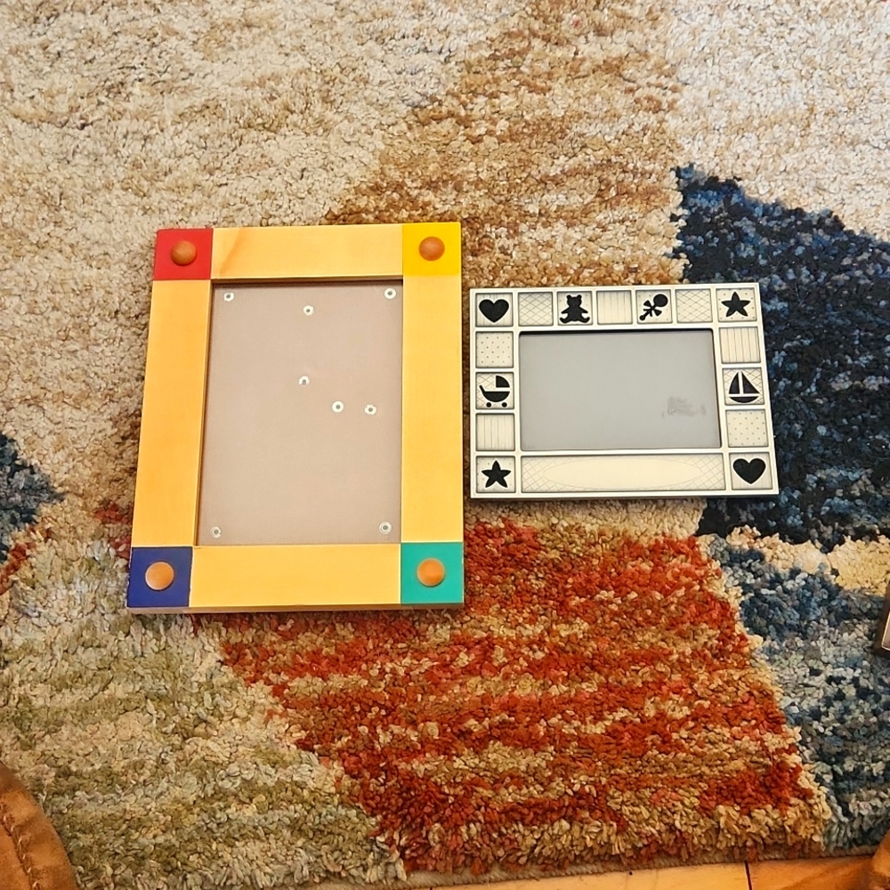 2 children's/ baby frames.  The silver one is 3x5 and the wood one is 5x7